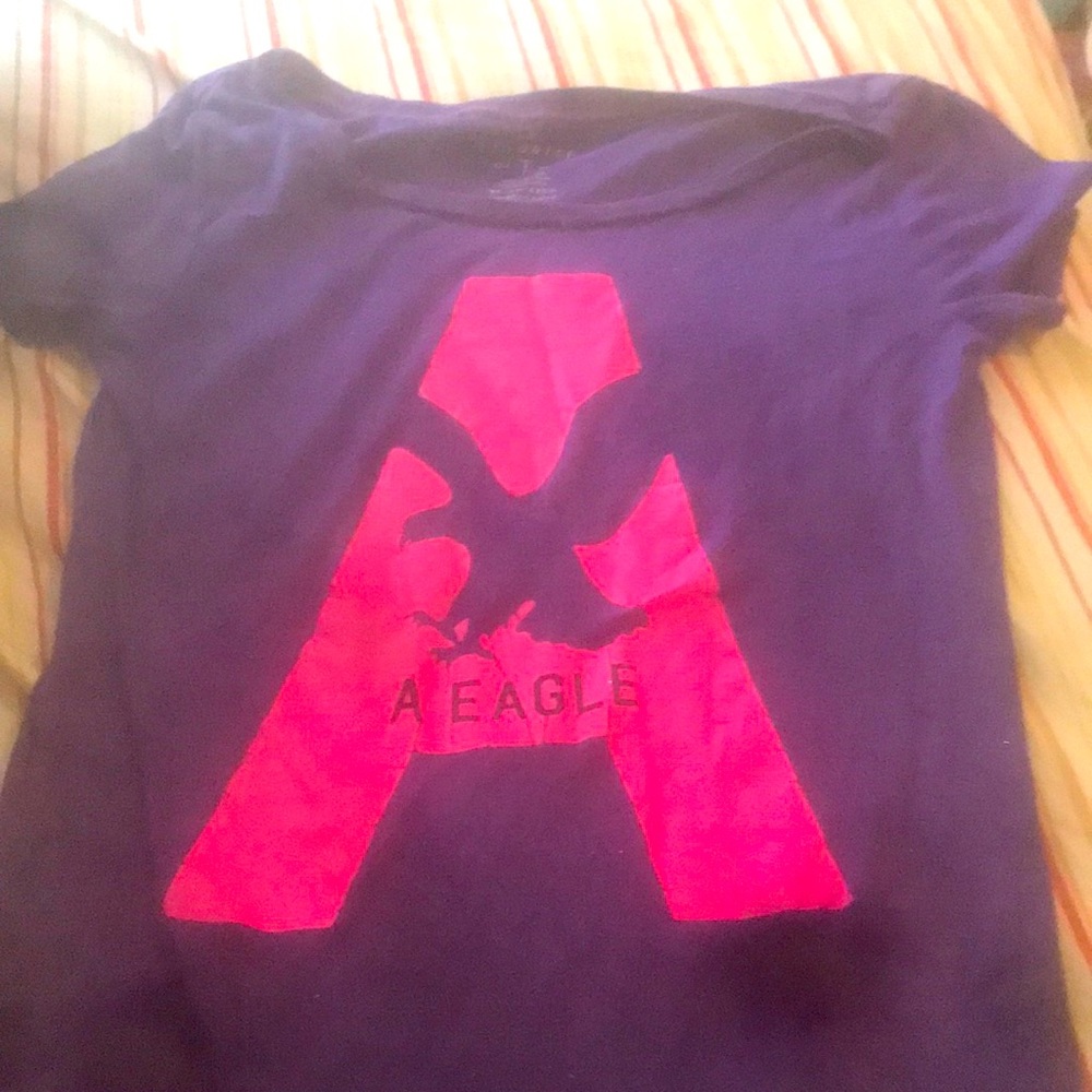American eagle extra small, purple shirt with Eagle.
